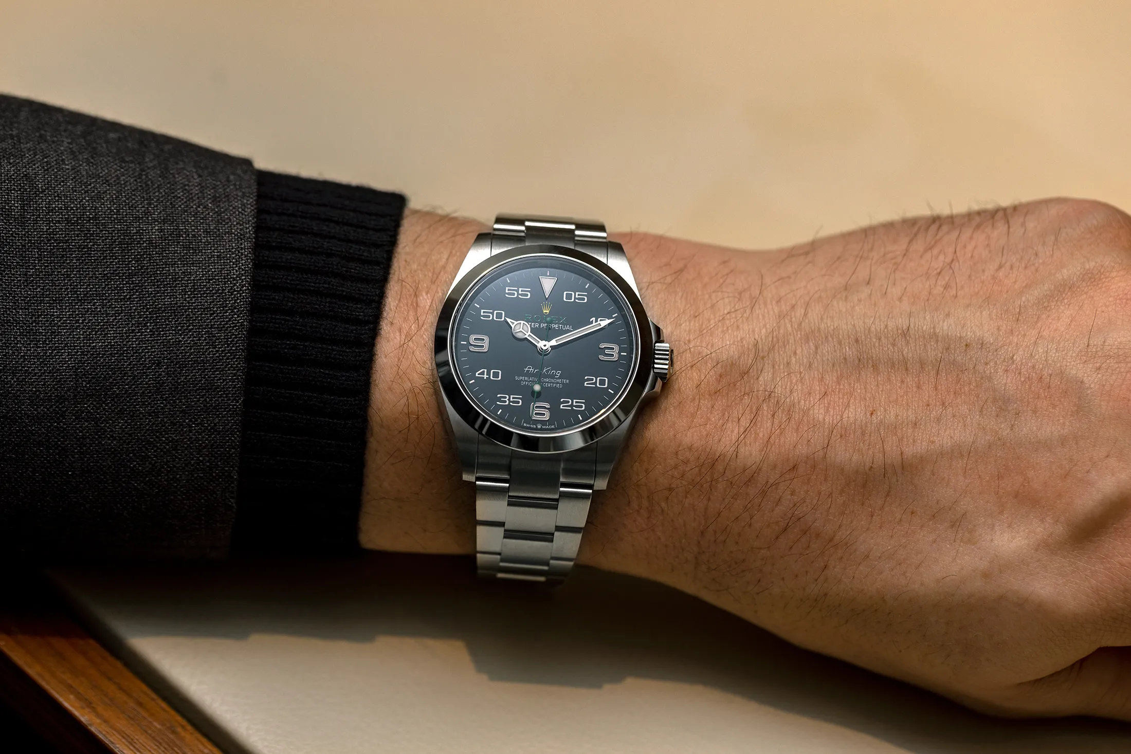 Air-King superclone side profile on wrist – shows case thickness, crown guards, and bracelet articulation for comfort assessment.