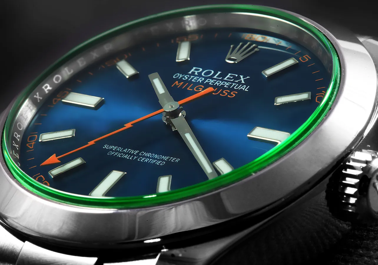 Milgauss Z-Blue superclone detailed dial shot – blue gradient, orange hand, and green crystal edge.