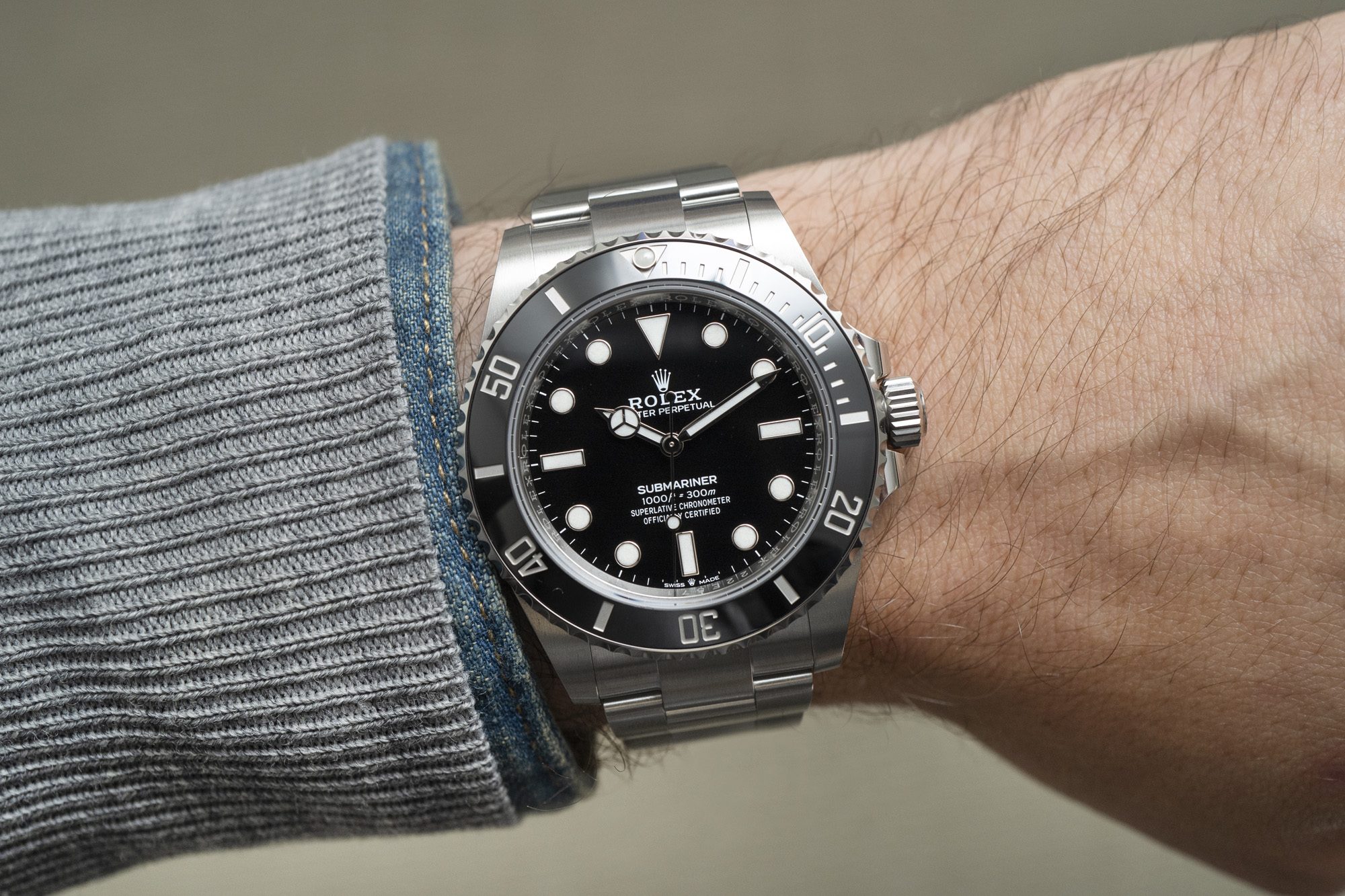 Premium superclone Rolex Submariner No-Date 124060 on display stand, showcasing matte black dial and ceramic bezel.