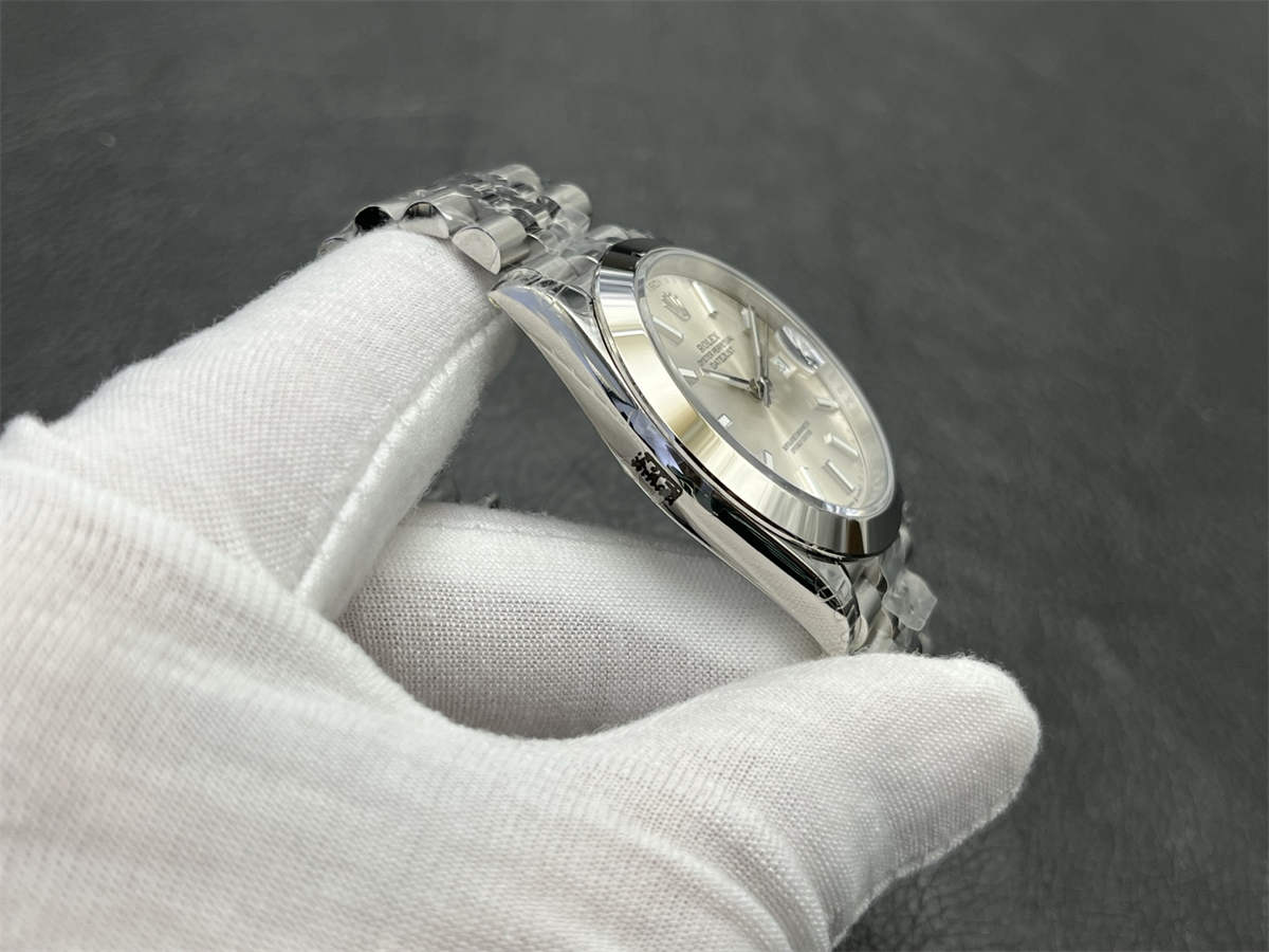Side-profile view of a Rolex Datejust 41 superclone showing the Jubilee bracelet curvature, case thickness, and lug-to-link transition on a gloved wrist.