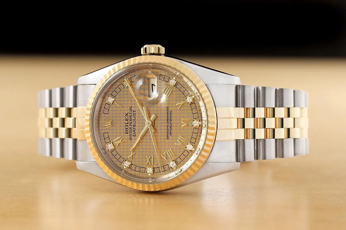Professional photo of Rolex Datejust superclone highlighting fluted bezel and two-tone bracelet details.